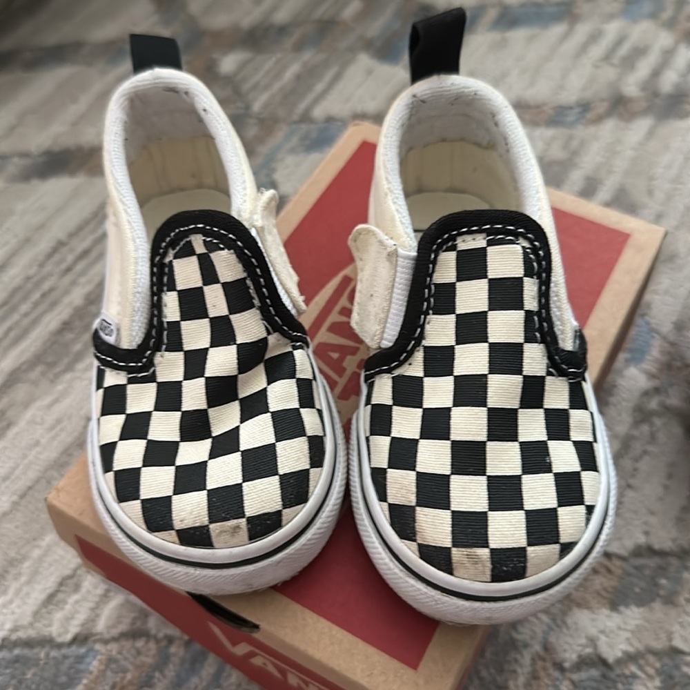 Vans • black and white checkered Velcro slip ons